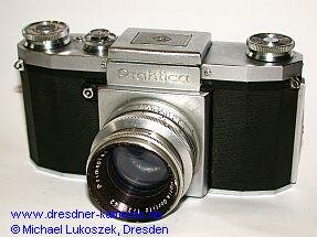 Praktica (1950) mit Meyer Primoplan 1,9/58 - Modell mit eingeschraubten Tragesen