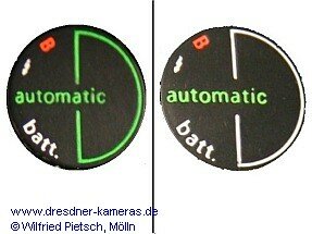 Praktica B100 - unterschiedliche Zeit-Einstellscheiben: grne Linie an Kameras mit genopptem Bezug; weie Linie an Kameras mit glattem Bezug
