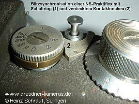 Praktiflex Version 6 mit Blitzsynchronisation durch Schaltring und verdecktem Kontaktnocken sowie zwei Blitzbuchsen vorn in der Deckkappe